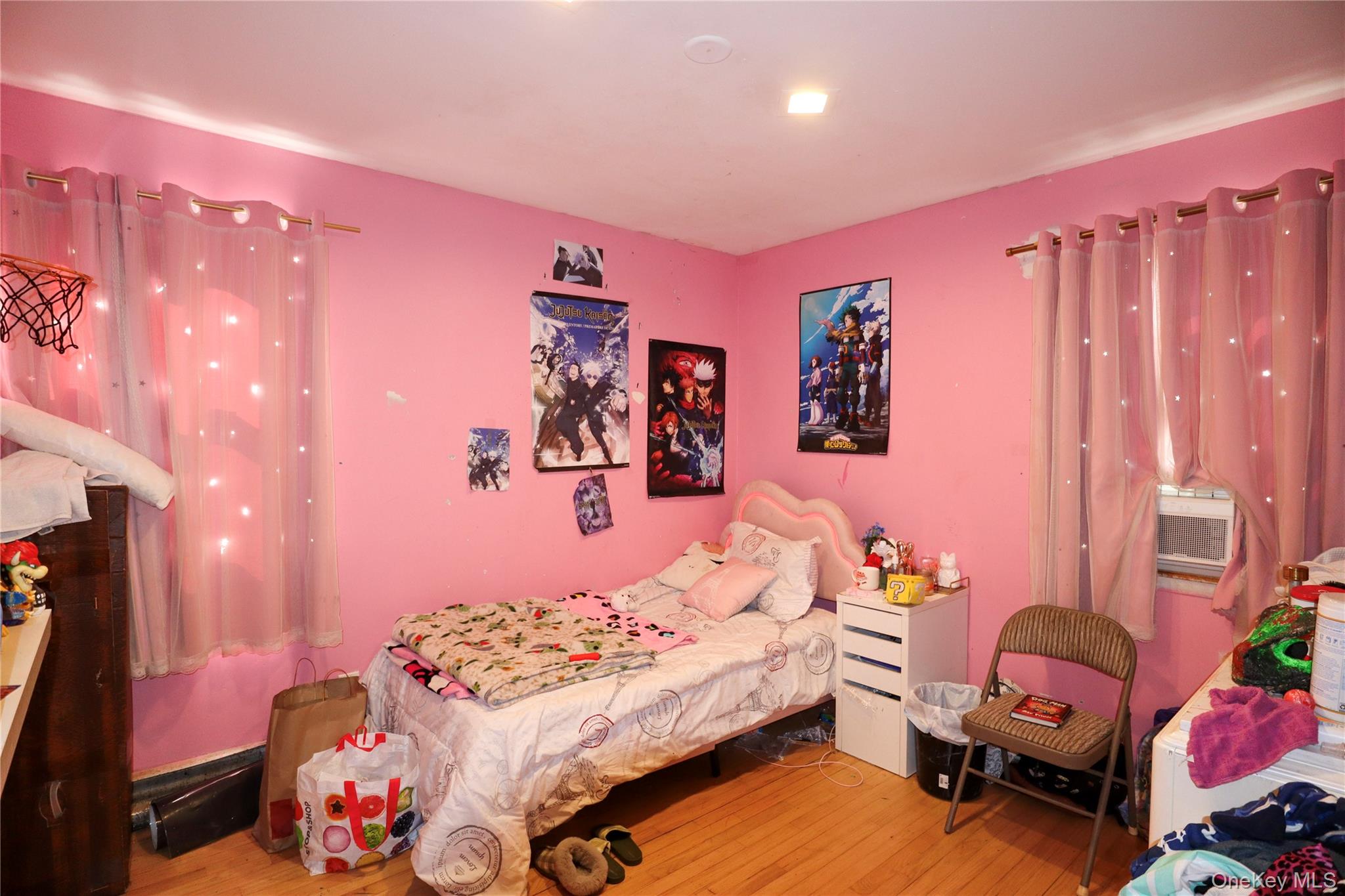 143 Jefferson Avenue Wyandanch, NY 11704 - Photo 17 of 37 a bedroom with furniture and a bed