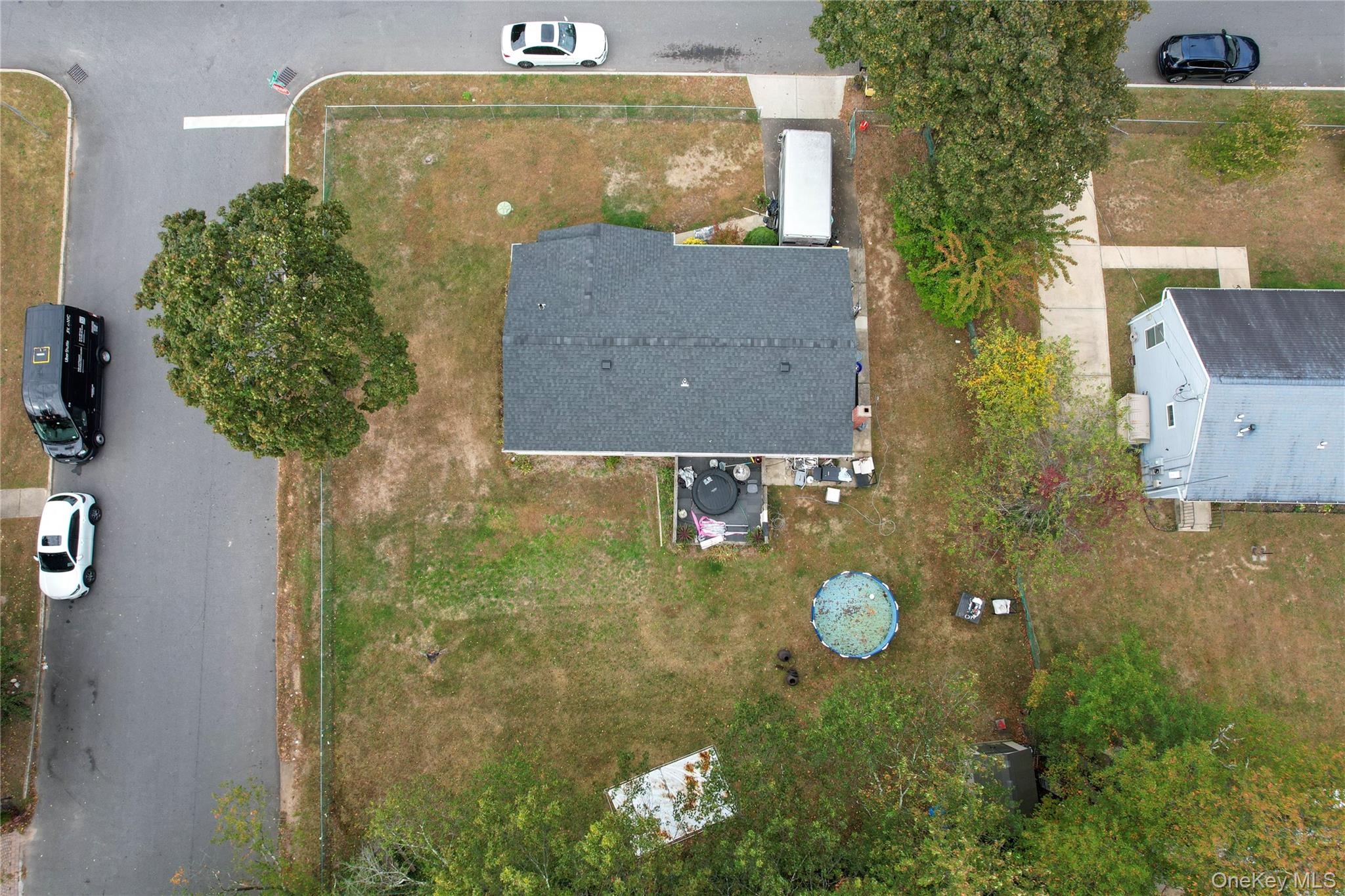 143 Jefferson Avenue Wyandanch, NY 11704 - Photo 29 of 37 aerial view of a house with a garden