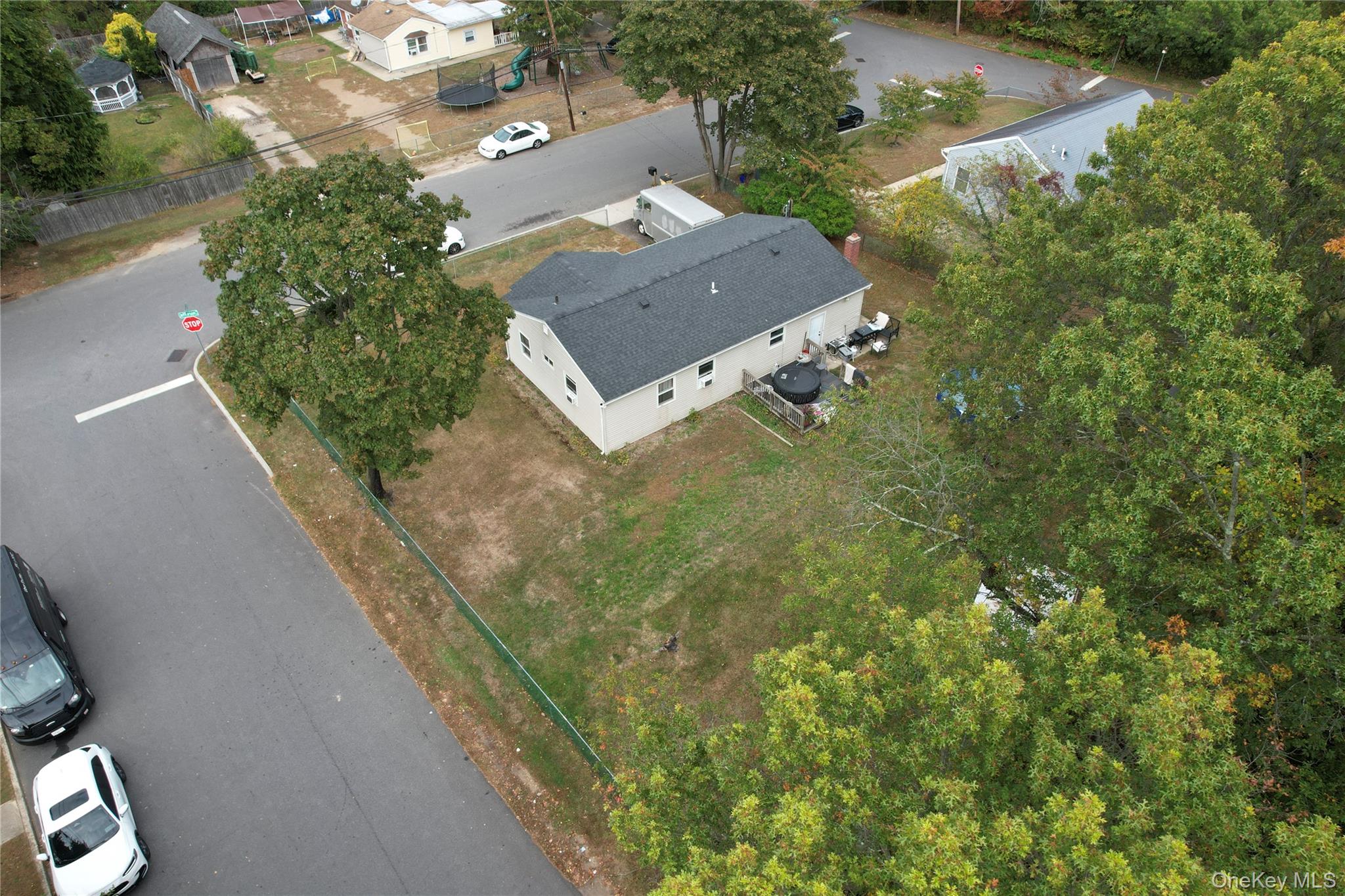 143 Jefferson Avenue Wyandanch, NY 11704 - Photo 30 of 37 an aerial view of a house with a yard