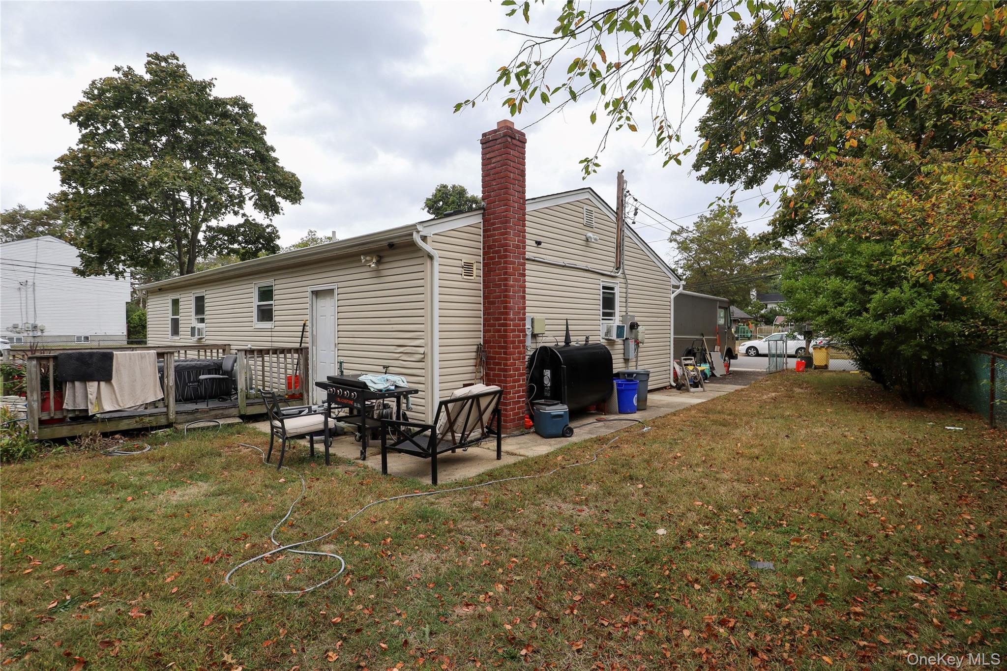 143 Jefferson Avenue Wyandanch, NY 11704 - Photo 34 of 37 a view of a house with patio