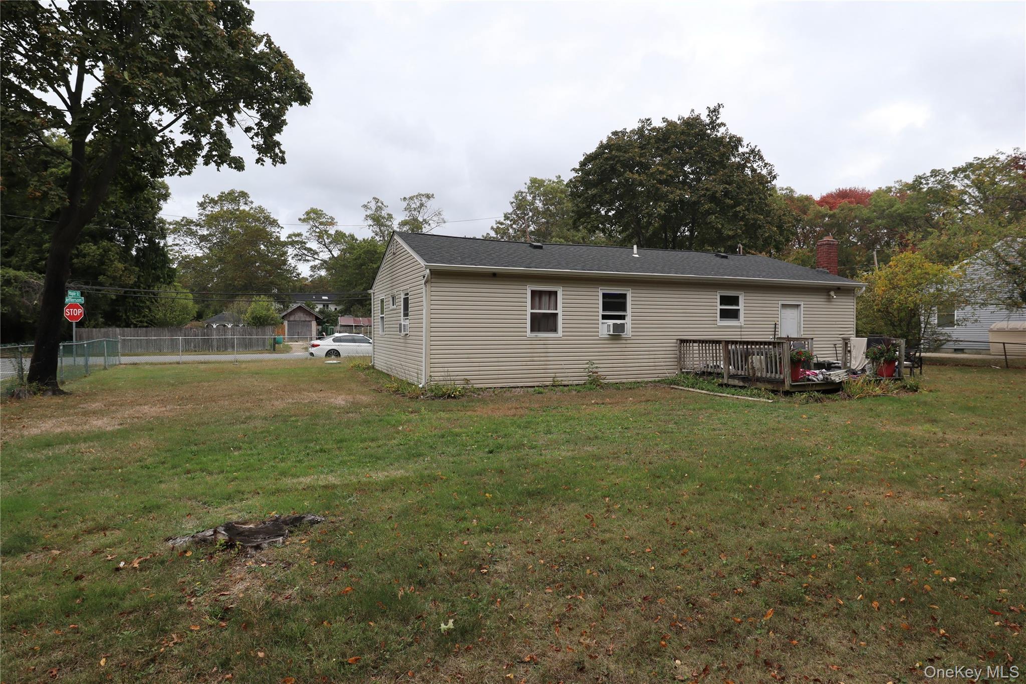 143 Jefferson Avenue Wyandanch, NY 11704 - Photo 35 of 37 a view of a backyard with a garden and entertaining space