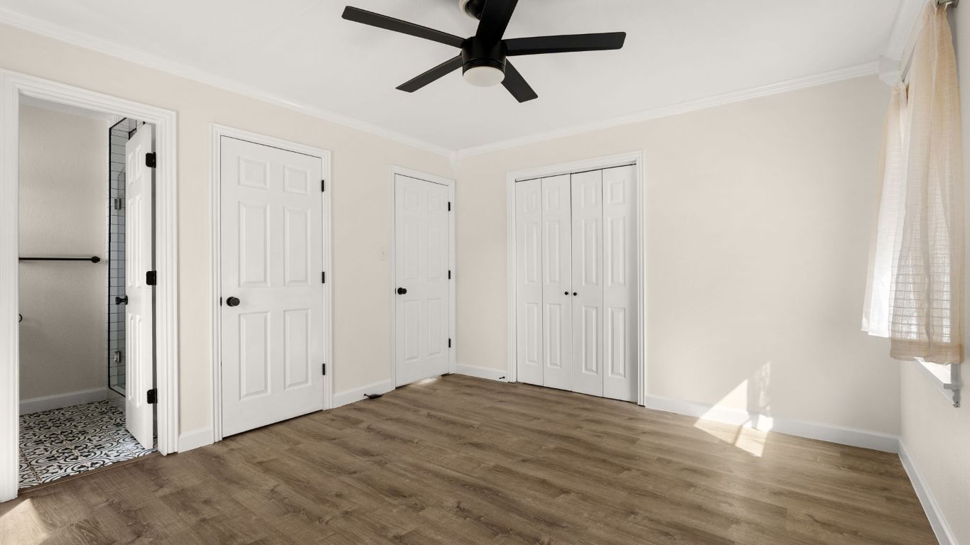 2118 Fordham Lane Austin, TX 78723 - Photo 16 of 28 a view of empty room with wooden floor