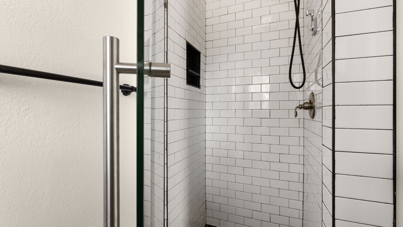 2118 Fordham Lane Austin, TX 78723 - Photo 23 of 28 a bathroom with a shower