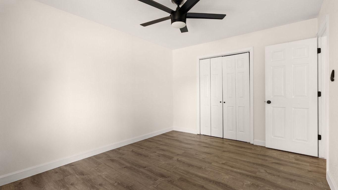 2118 Fordham Lane Austin, TX 78723 - Photo 25 of 28 a view of a room with wooden floor