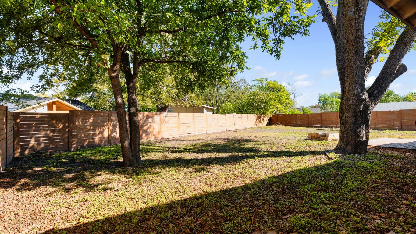 2118 Fordham Lane Austin, TX 78723 - Photo 27 of 28 a view of a yard with large tree