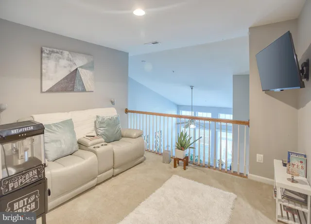 a spacious bathroom with a double vanity sink toilet mirror and shower