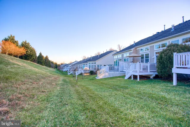 a childrens park with lots of swings and slides