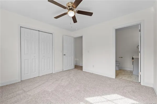a view of a big room with carpet