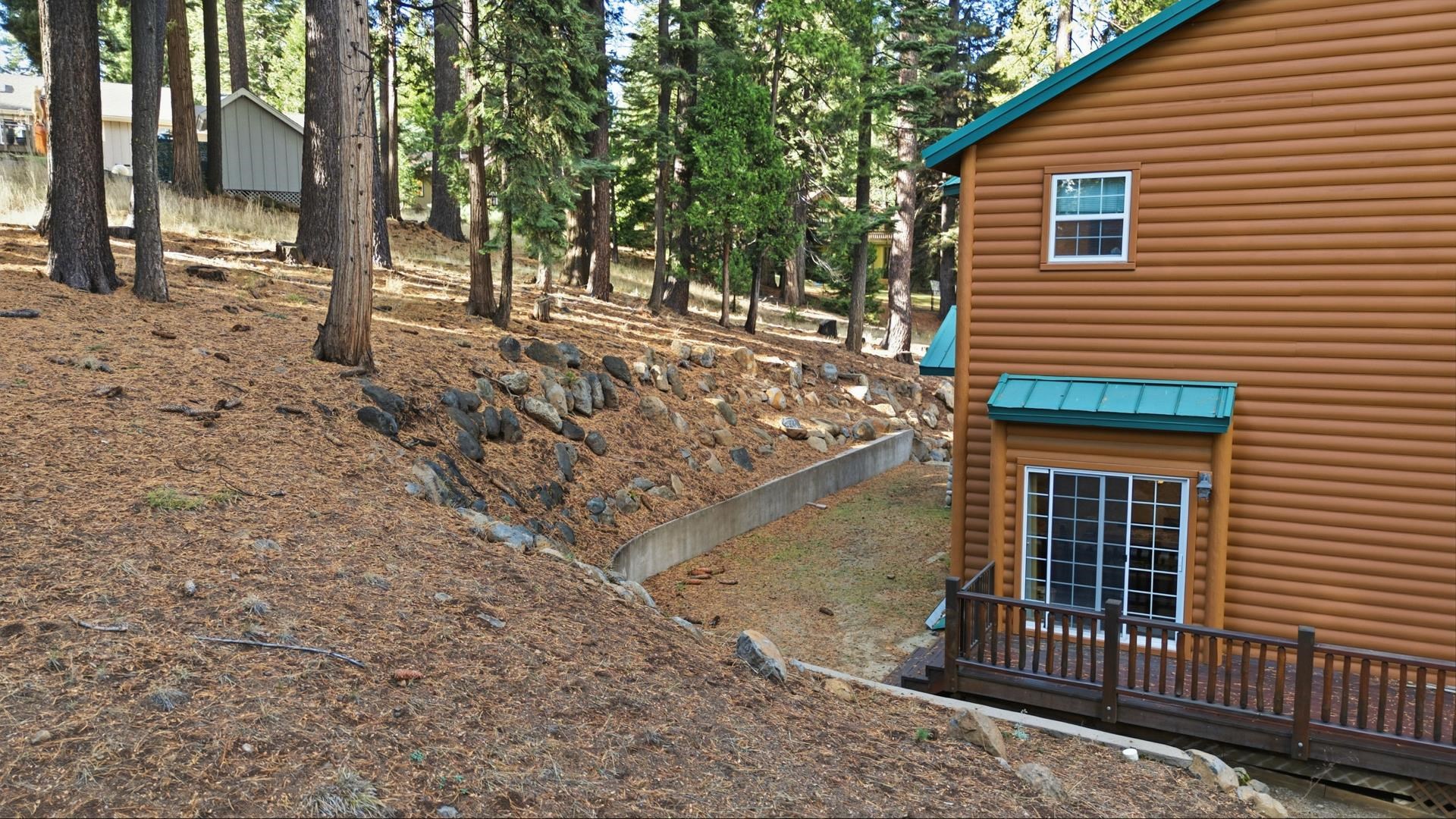 1017 Timber Ridge Road Lake Almanor, CA 96137 - Photo 42 of 45 a view of a backyard with pathway