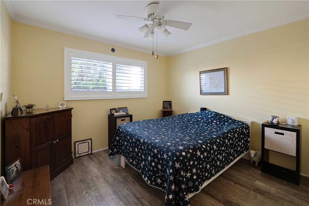 813 Statler Street San Pedro, CA 90731 - Photo 31 of 42 a bedroom with bed and a window