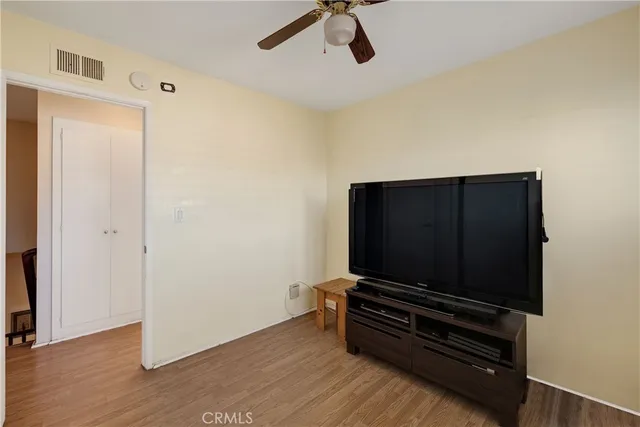 a room with furniture and flat screen tv