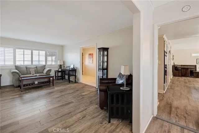 a view of a livingroom with furniture and windows