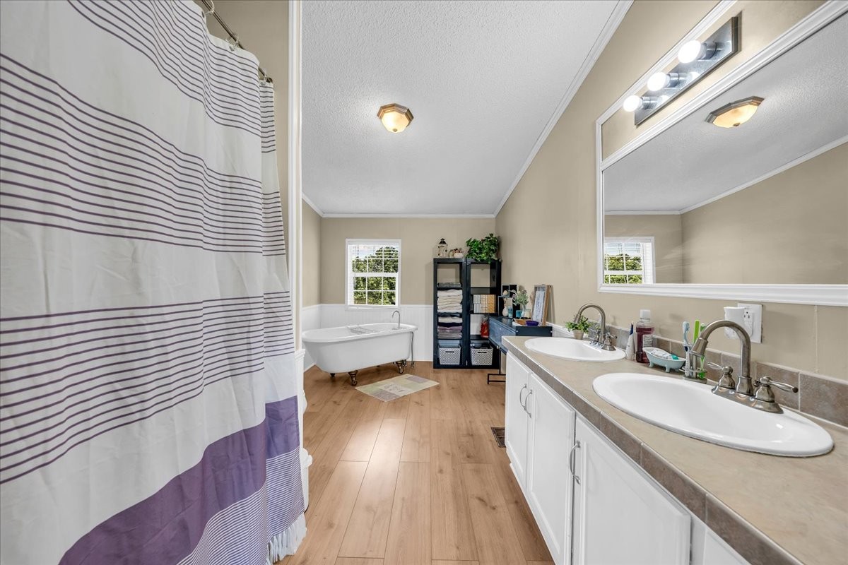 2657 Oak Grove Road Red Boiling Springs, TN 37150 - Photo 15 of 45 a bathroom with a sink and a large mirror