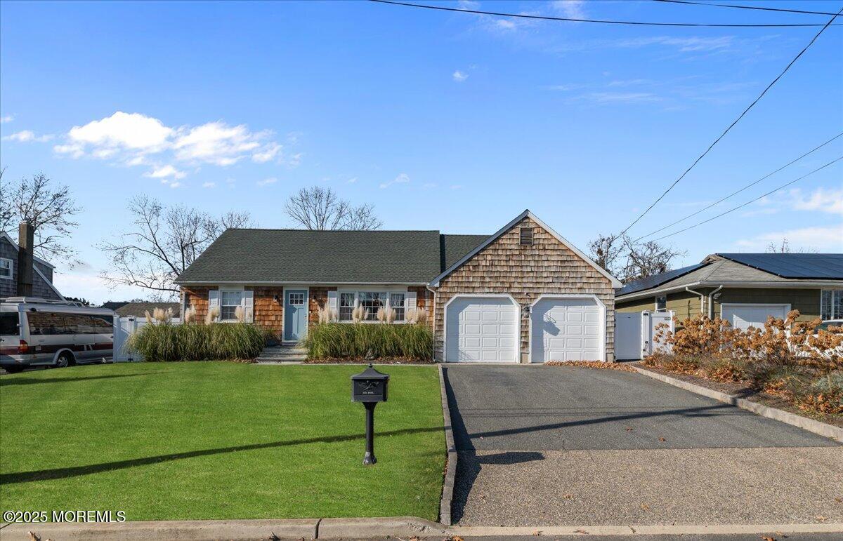 525 Riverwood Avenue Point Pleasant, NJ 08742 - Photo 1 of 30 a house view with a garden space