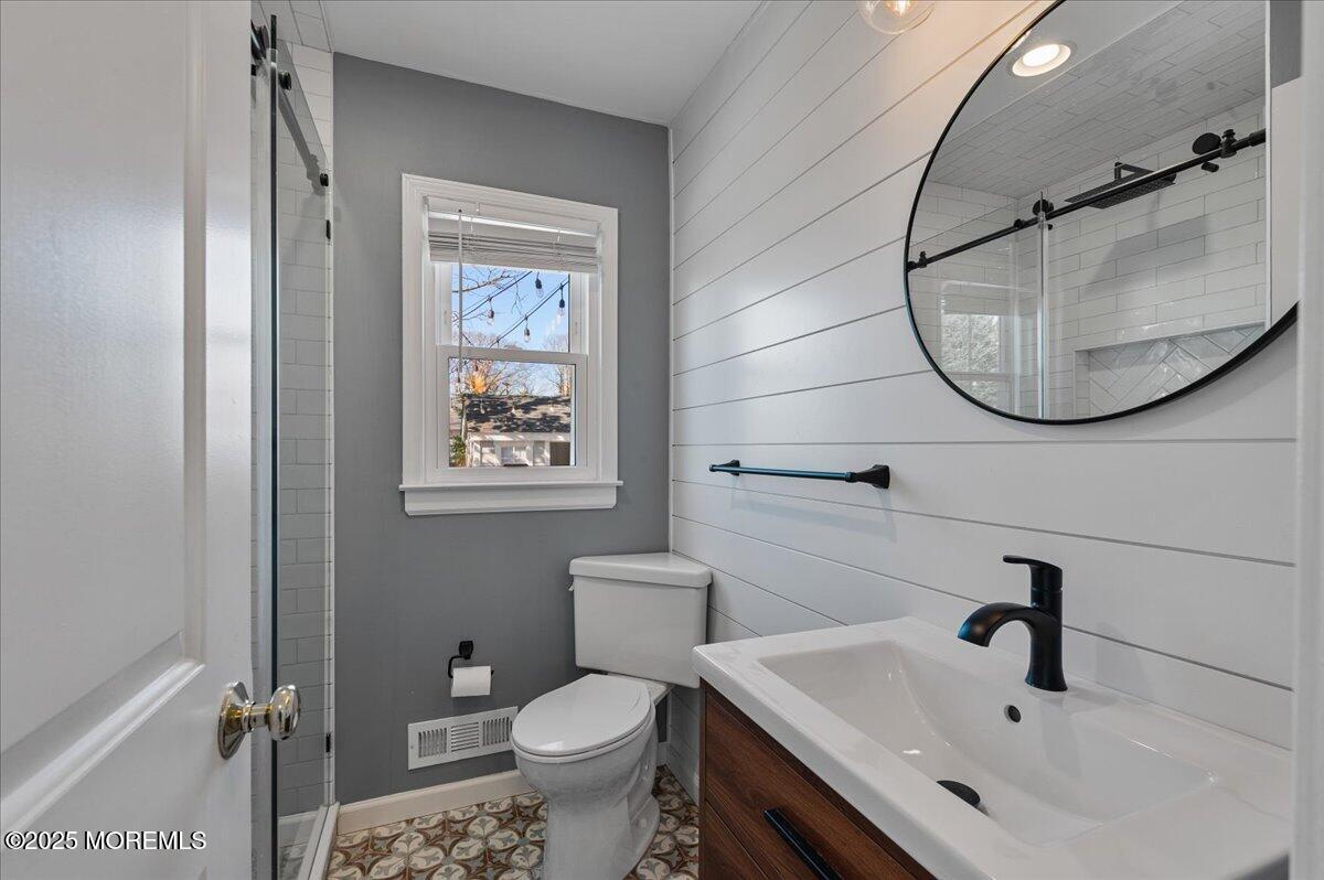 525 Riverwood Avenue Point Pleasant, NJ 08742 - Photo 15 of 30 a bathroom with a sink mirror and toilet