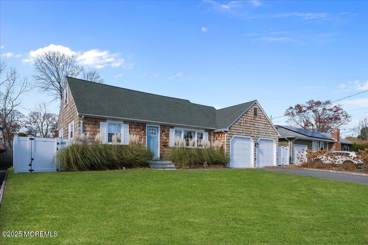 525 Riverwood Avenue Point Pleasant, NJ 08742 - Photo 3 of 30 a view of a house with a garden