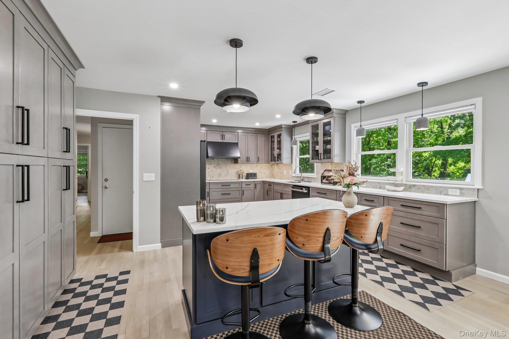 62 Mohegan Road Larchmont, NY 10538 - Photo 21 of 46 a very nice looking dining room with a table and chairs