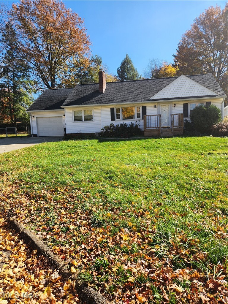 2440 Midvale Road Northwest Canton, OH 44708 - Photo 1 of 22 Single story home with a garage and a front yard