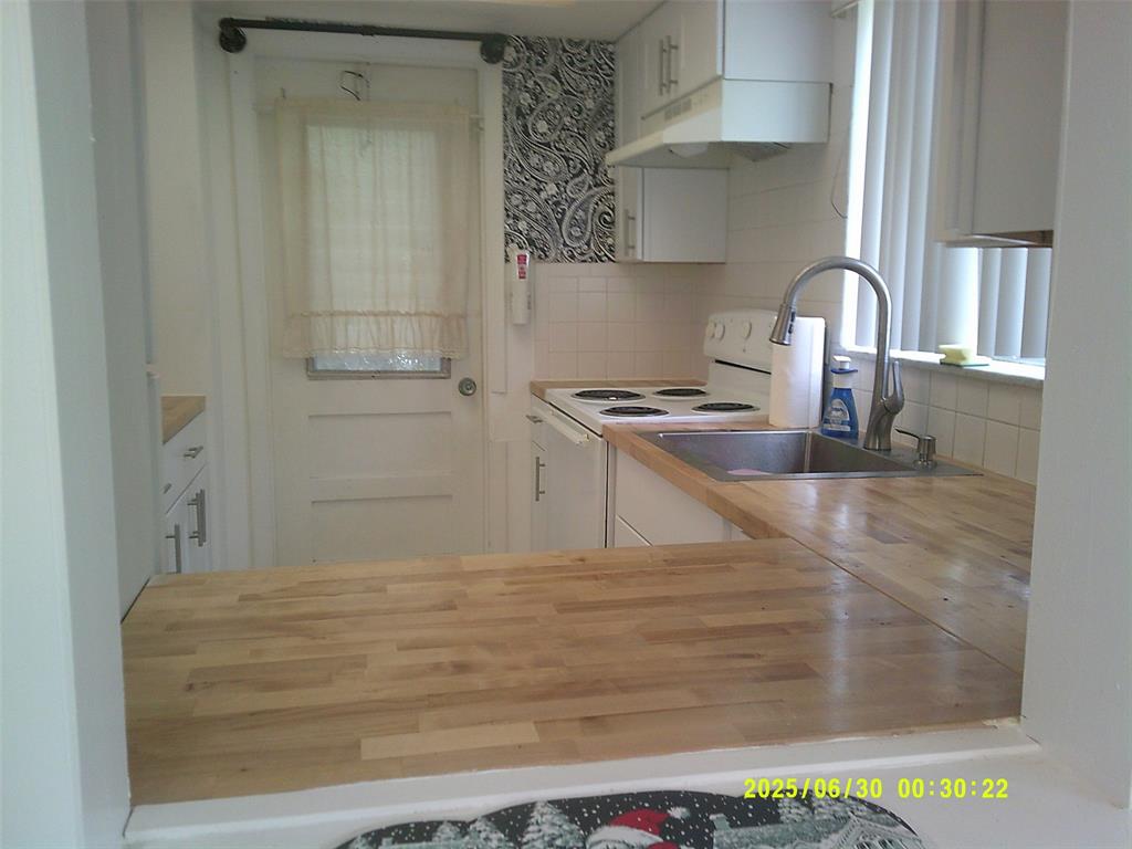 5800 Margate Boulevard, Unit 411 Pompano Beach, FL 33063 - Photo 15 of 30 a bathroom with a sink and a mirror