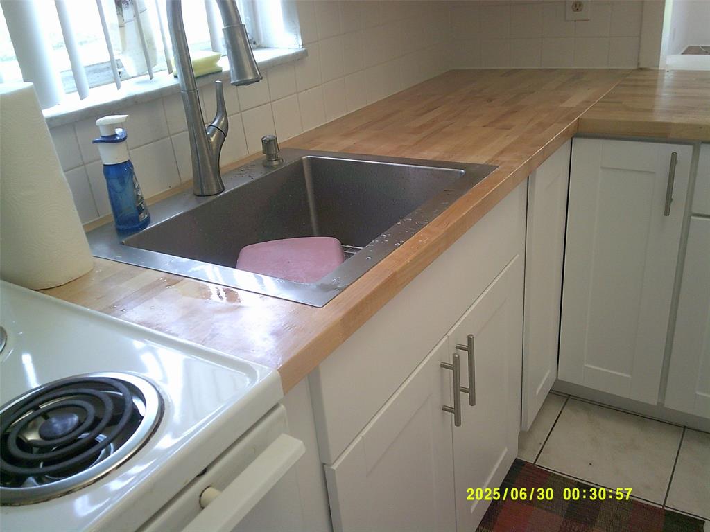 5800 Margate Boulevard, Unit 411 Pompano Beach, FL 33063 - Photo 20 of 30 a view of utility room