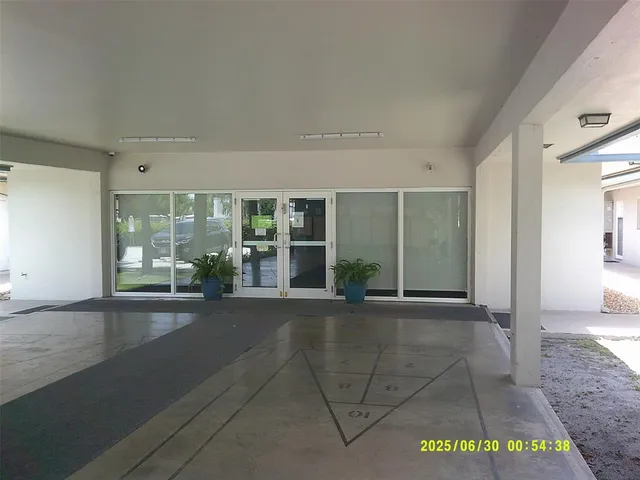 a view of an entryway with a window