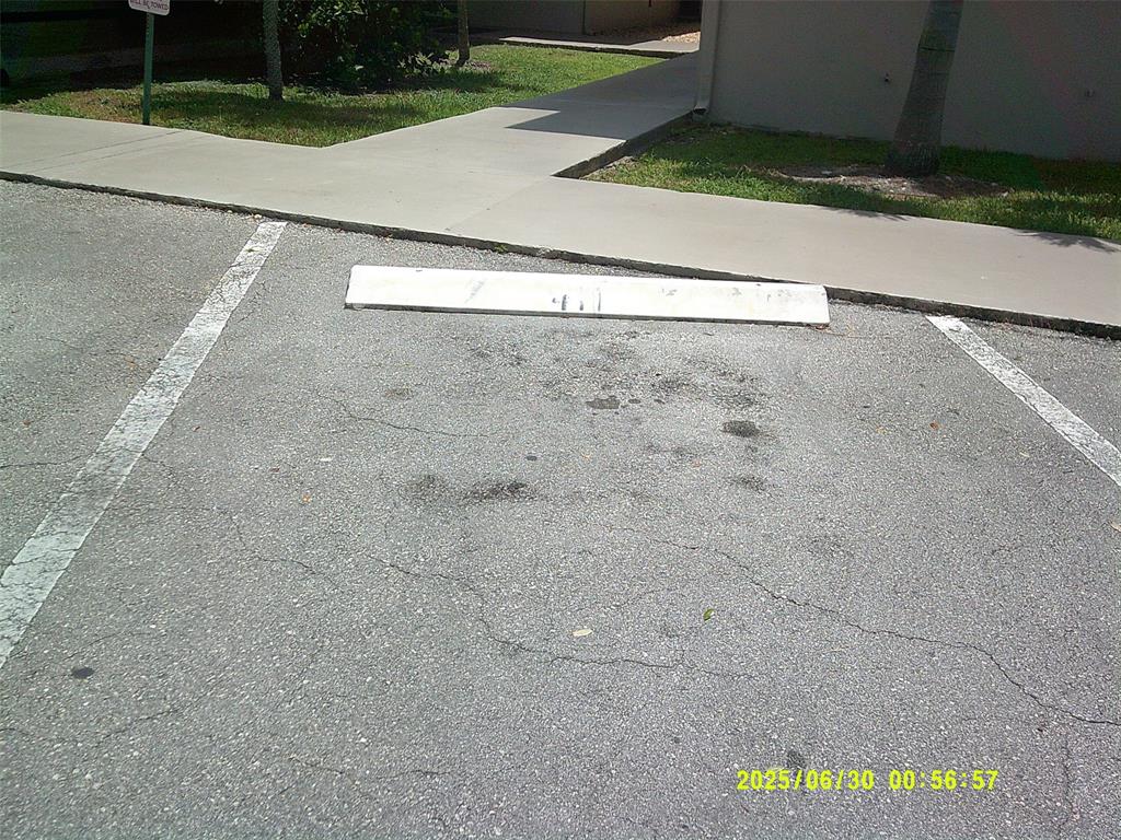 5800 Margate Boulevard, Unit 411 Pompano Beach, FL 33063 - Photo 30 of 30 a view of a parking space