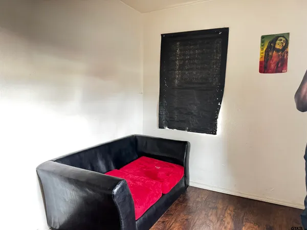 a living room with a rug