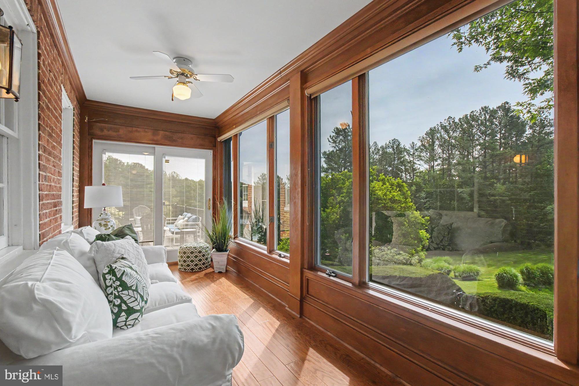 18535 Foreston Road Parkton, MD 21120 - Photo 12 of 101 Sunroom with views of the park like grounds.