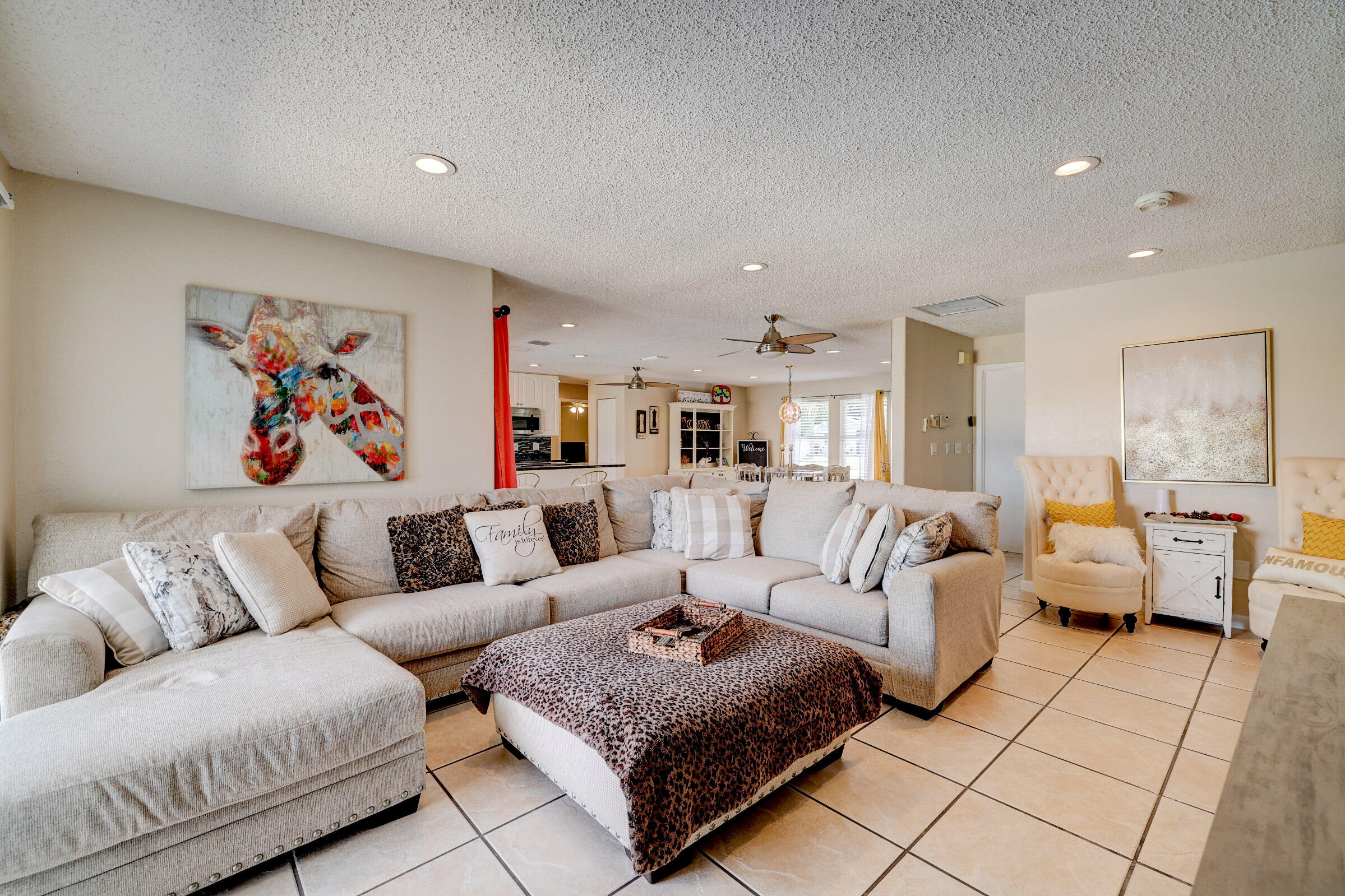 2068 Southeast Triumph Road Port St. Lucie, FL 34952 - Photo 12 of 59 a living room with furniture and a couch