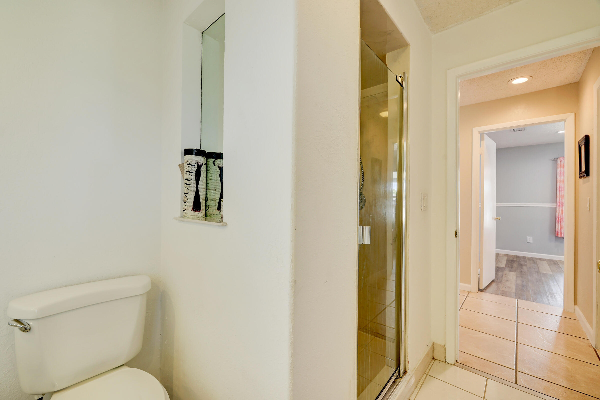 2068 Southeast Triumph Road Port St. Lucie, FL 34952 - Photo 20 of 59 a bathroom with a toilet shower and a sink