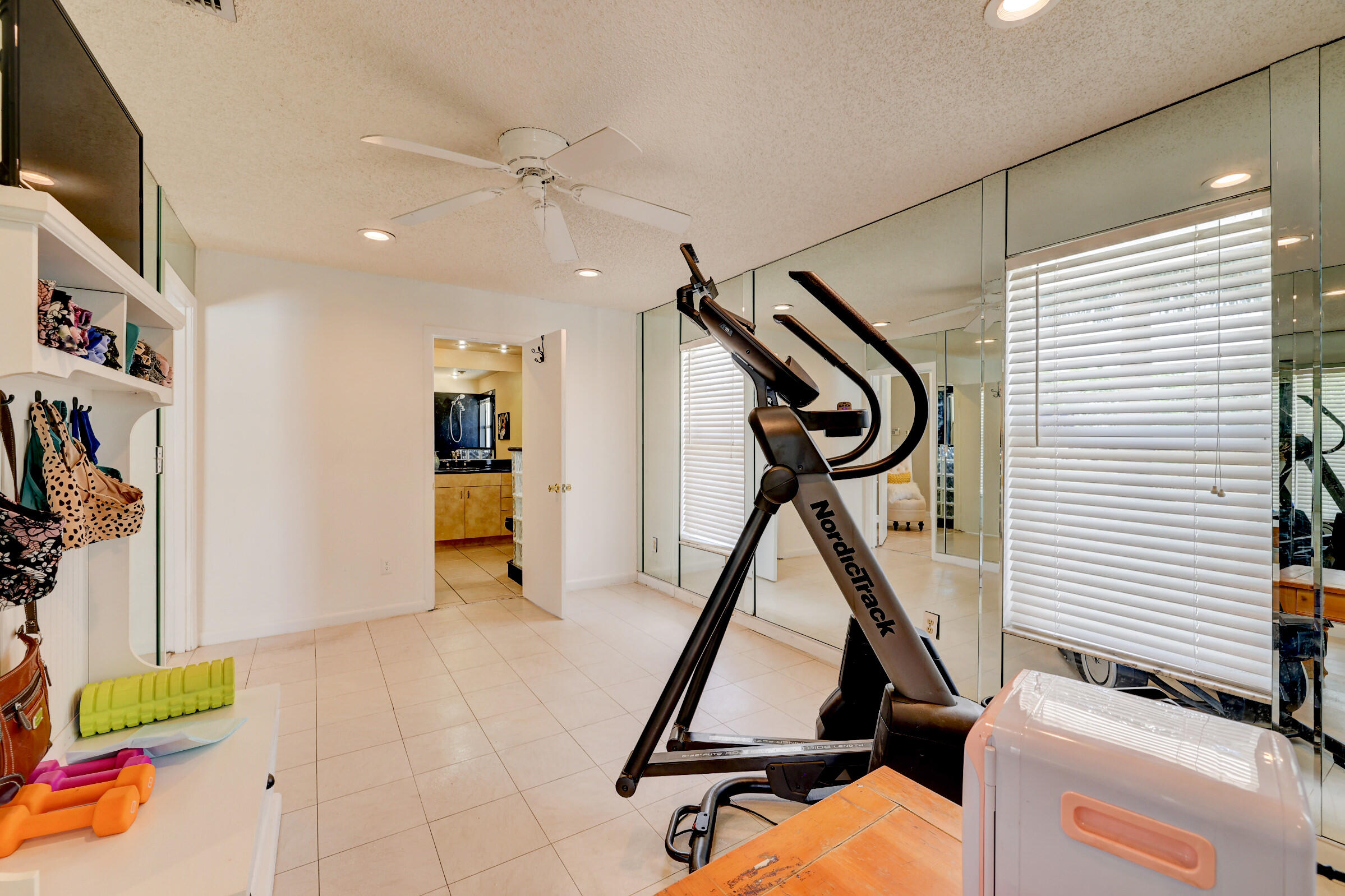 2068 Southeast Triumph Road Port St. Lucie, FL 34952 - Photo 25 of 59 a view of a room with gym equipment