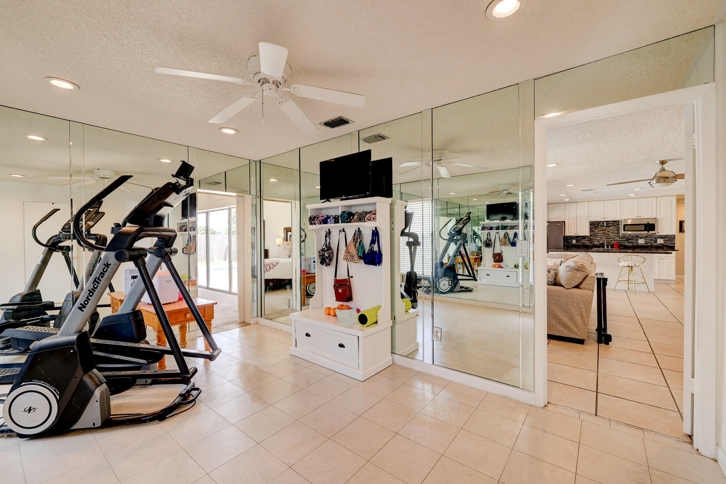 2068 Southeast Triumph Road Port St. Lucie, FL 34952 - Photo 26 of 59 a view of a room with gym equipment