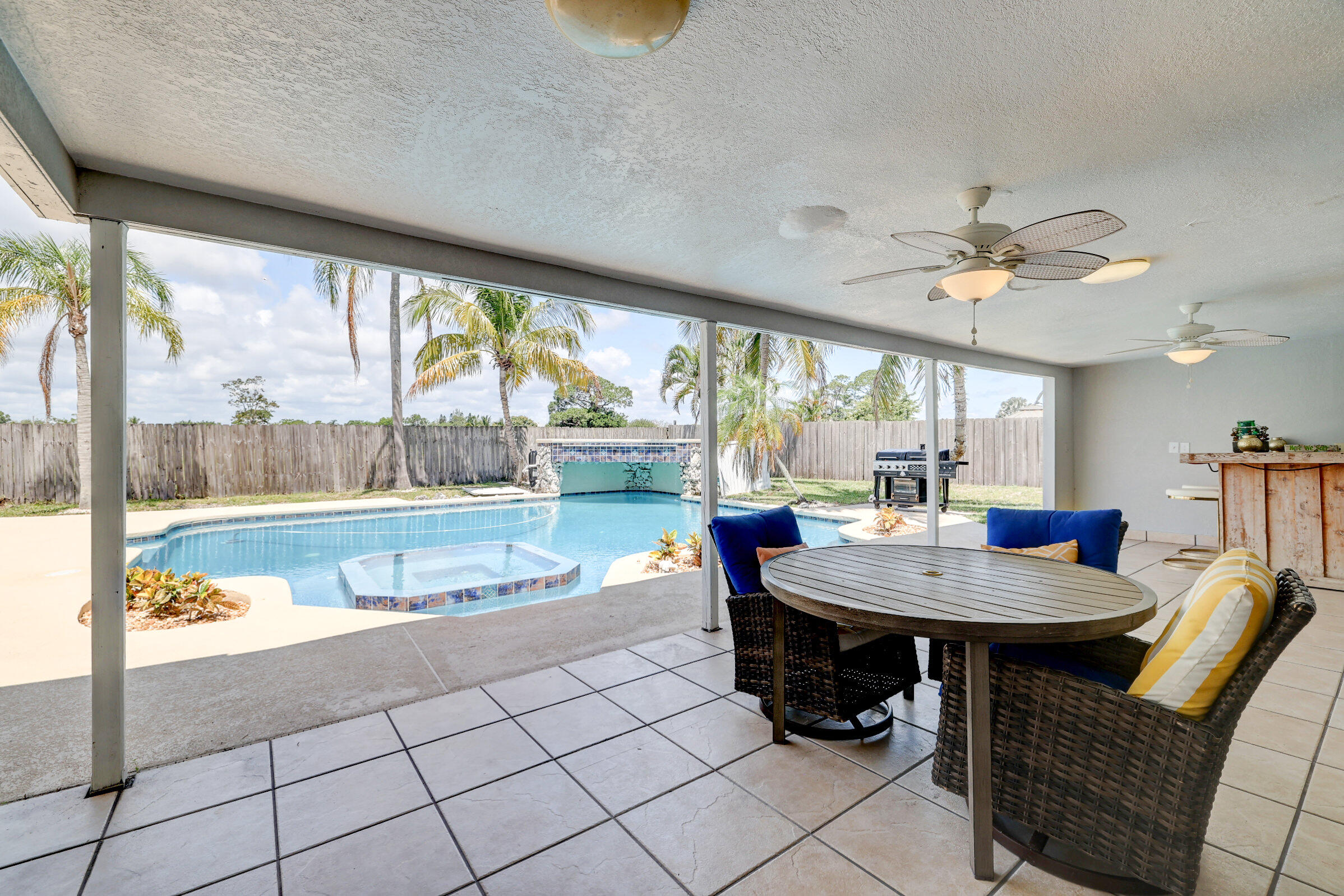 2068 Southeast Triumph Road Port St. Lucie, FL 34952 - Photo 31 of 59 a view of a dining room with furniture window and outside view