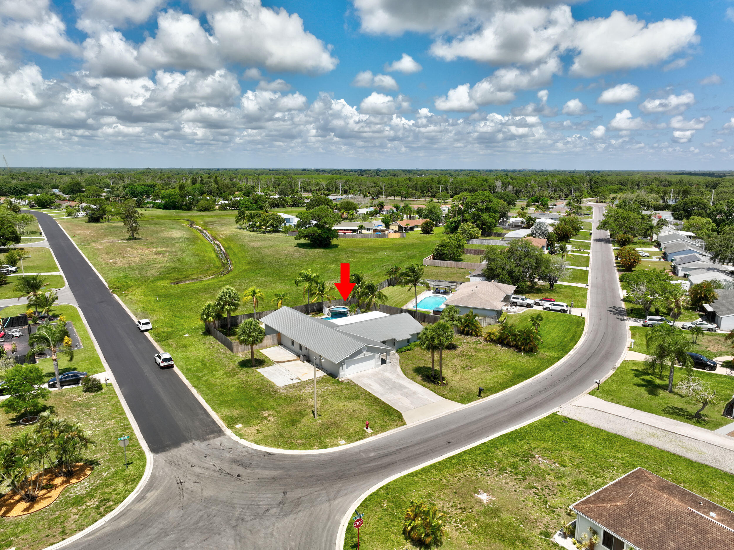 2068 Southeast Triumph Road Port St. Lucie, FL 34952 - Photo 49 of 59 a view of a garden with a flower in a pots