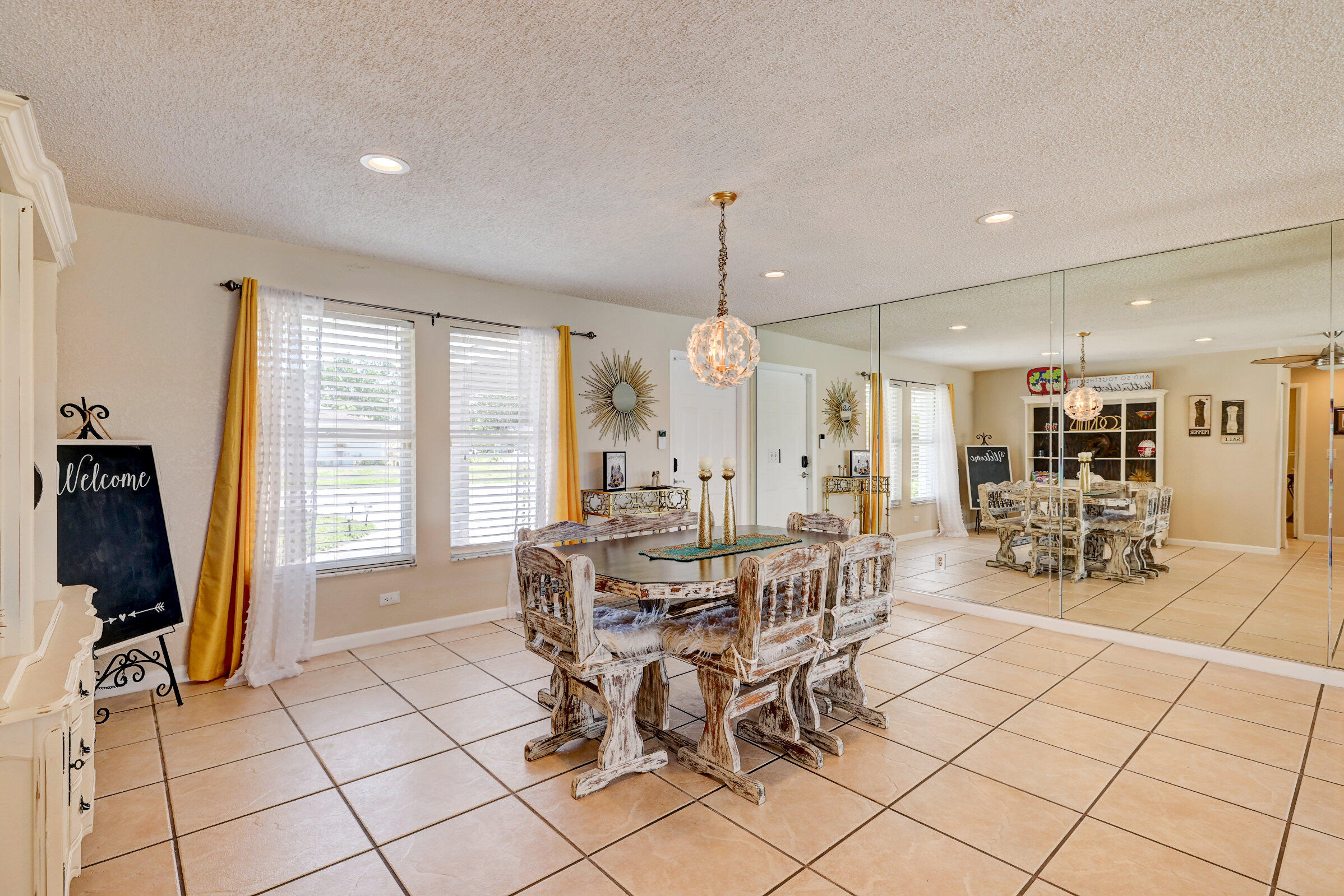 2068 Southeast Triumph Road Port St. Lucie, FL 34952 - Photo 5 of 59 a view of a dining room with furniture window and outside view
