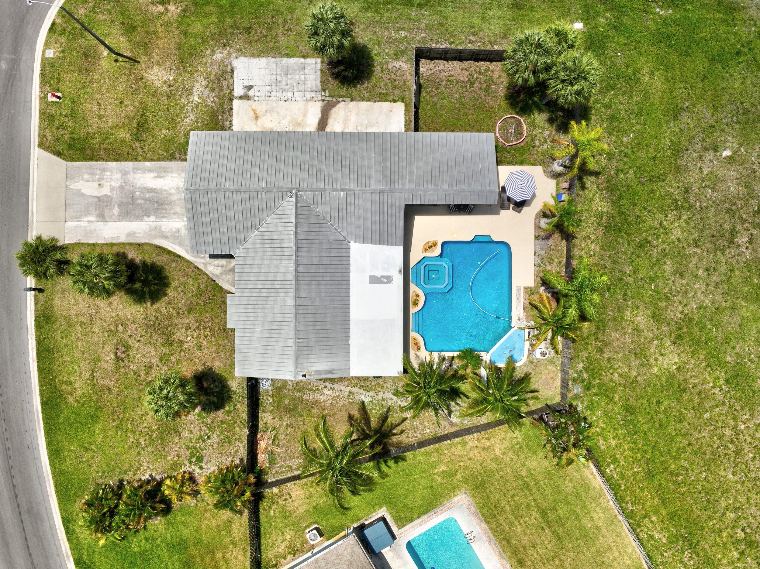 2068 Southeast Triumph Road Port St. Lucie, FL 34952 - Photo 56 of 59 view of a house with a yard
