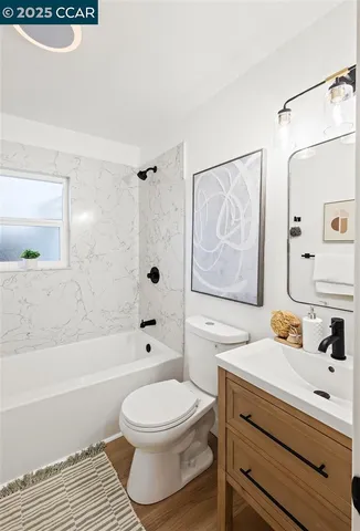 a view of a backyard with table and chairs and potted plants