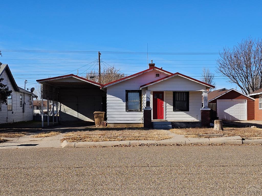 1049 Tipton Street Springfield, CO 81073 - Photo 1 of 20 a front view of a house with a yard