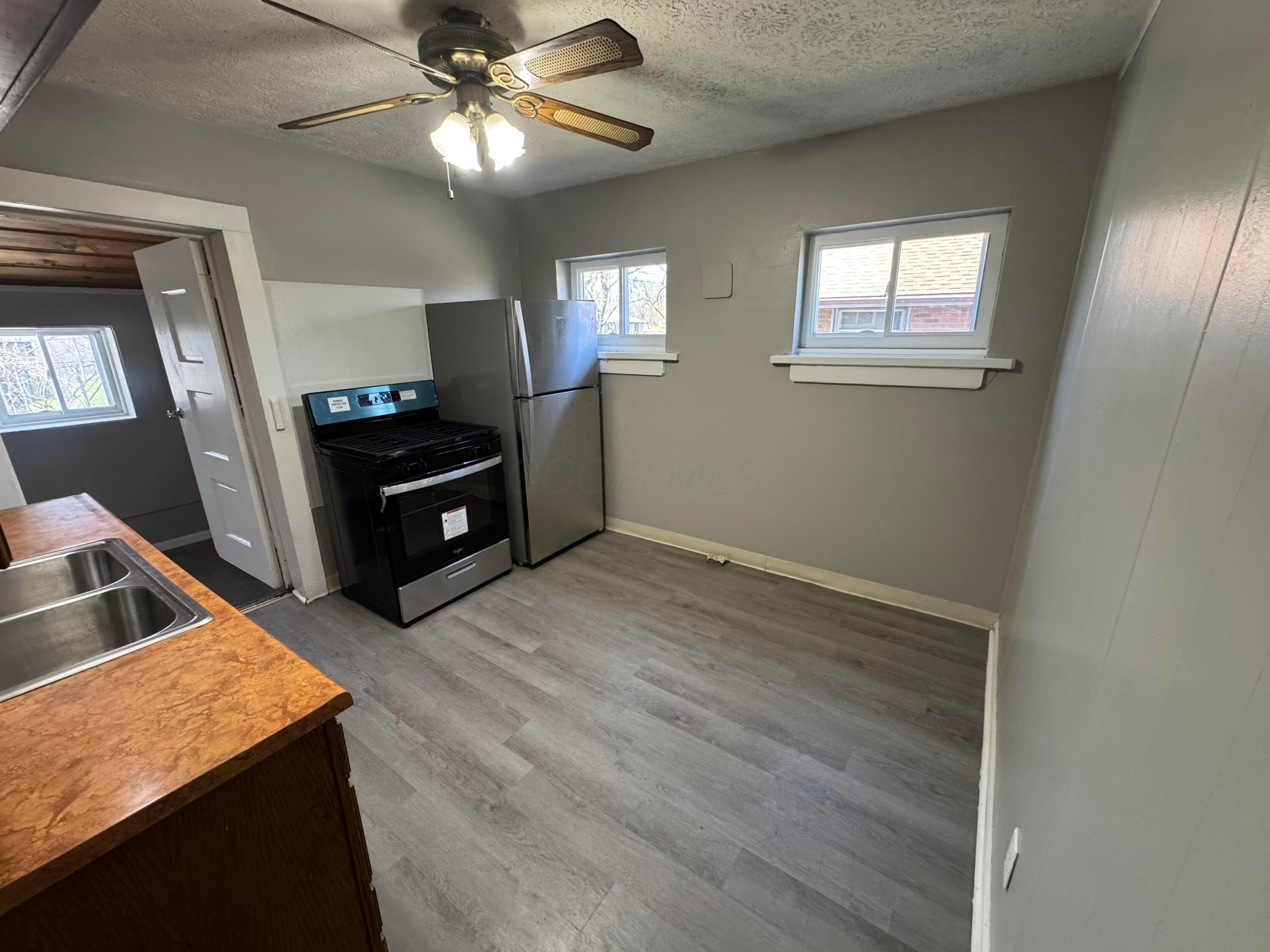 2499 Howey Road Columbus, OH 43211 - Photo 13 of 13 New gas stove and new fridge