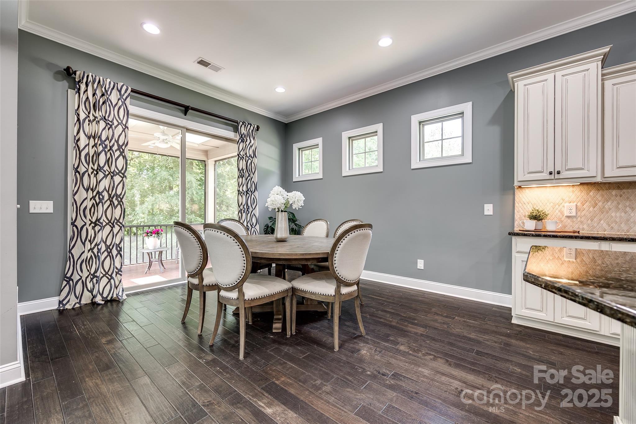 618 Chase Court Fort Mill, SC 29708 - Photo 16 of 48 a dining room with furniture window and wooden floor