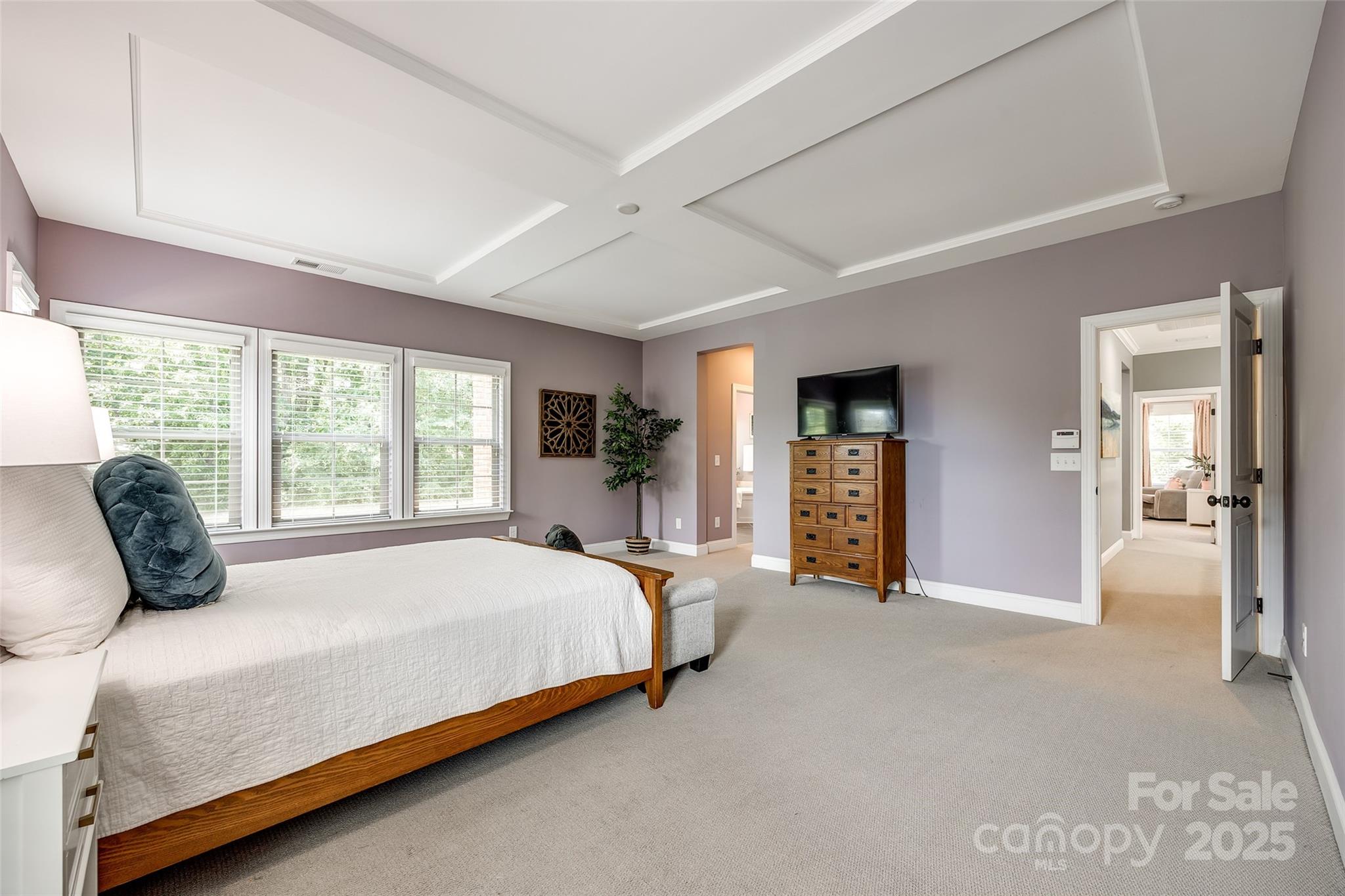 618 Chase Court Fort Mill, SC 29708 - Photo 27 of 48 a bedroom with a large bed and a large window