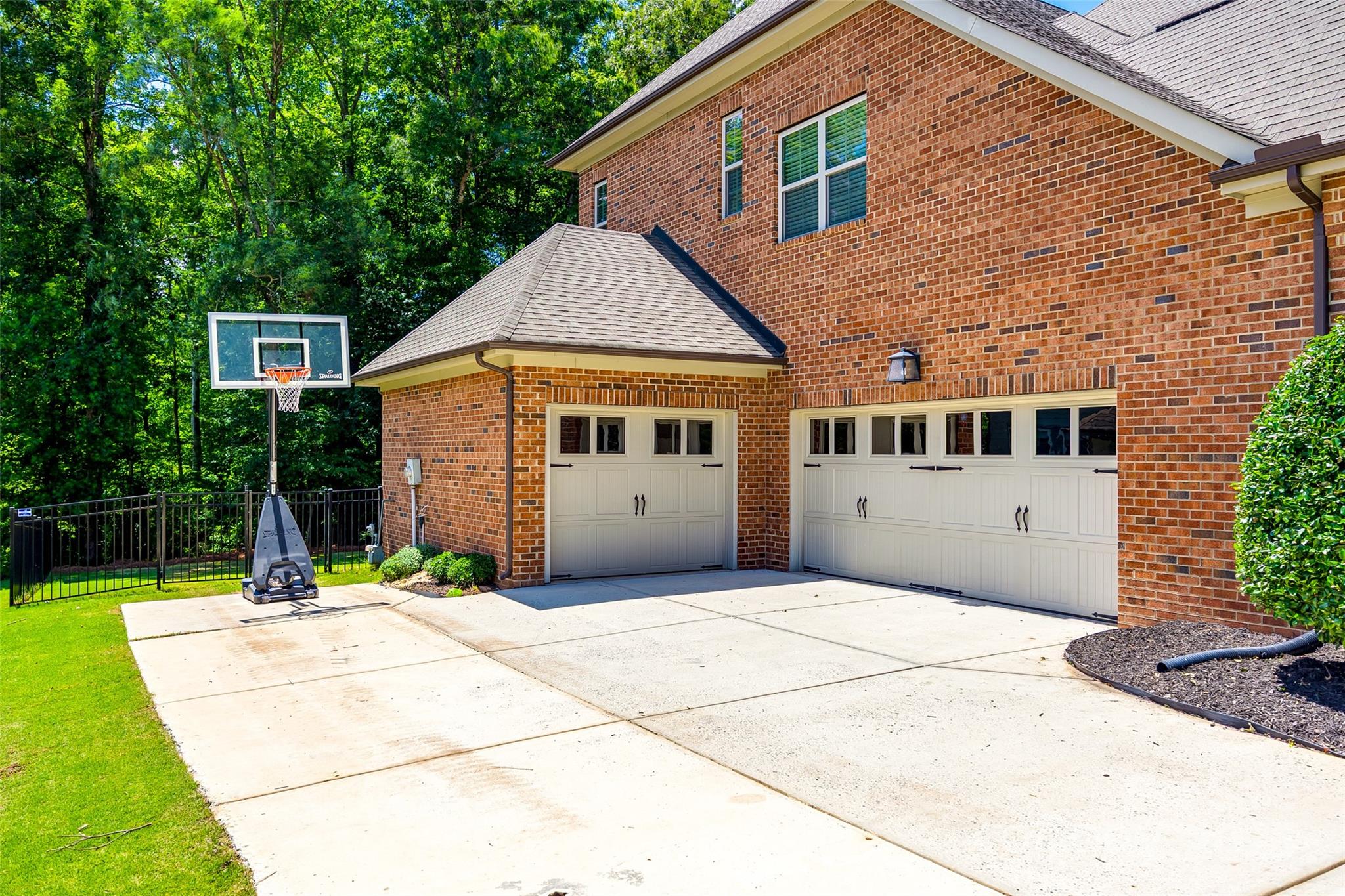 618 Chase Court Fort Mill, SC 29708 - Photo 3 of 48 a front view of a house with a yard and trees
