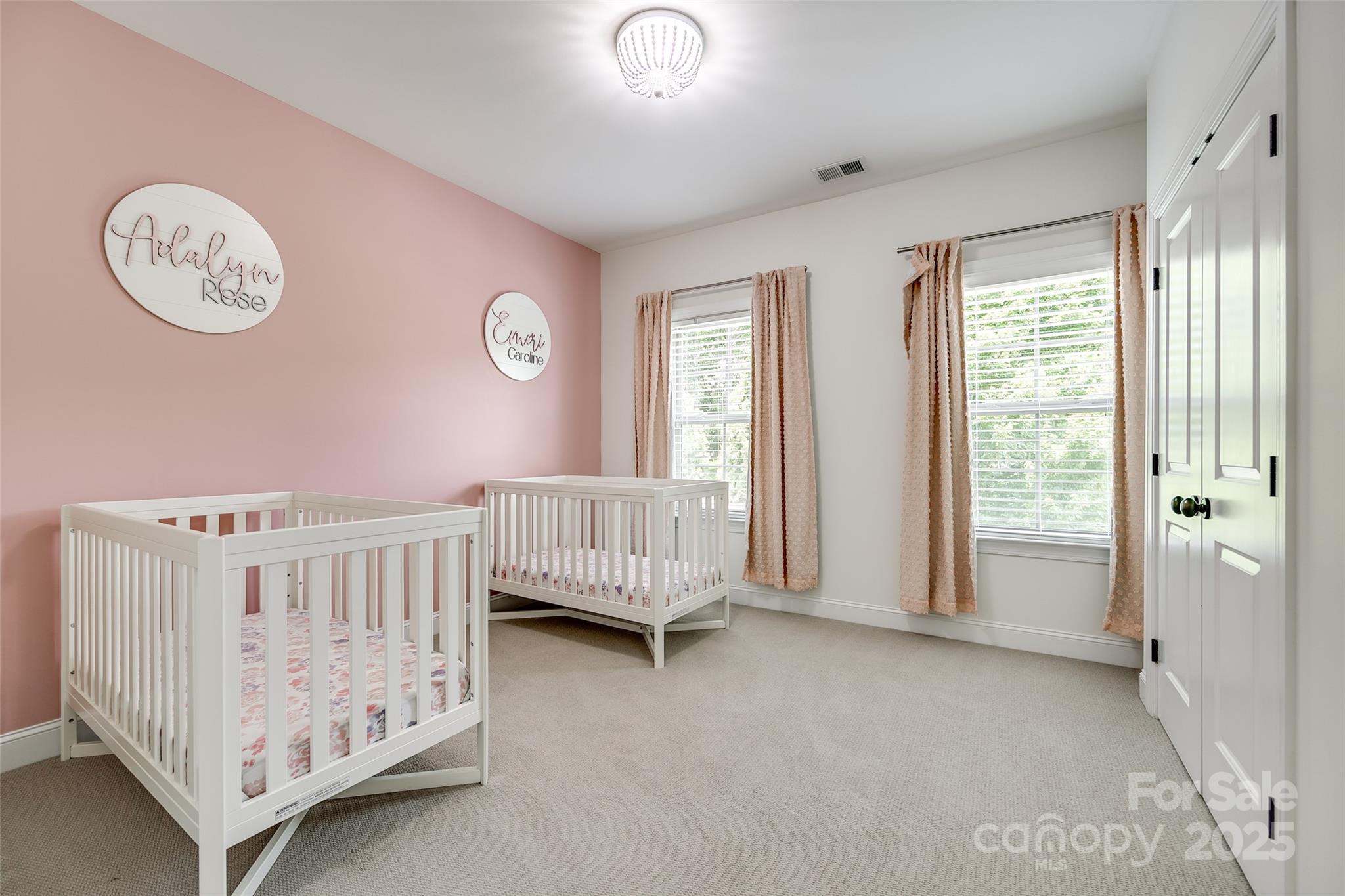 618 Chase Court Fort Mill, SC 29708 - Photo 32 of 48 a bedroom with a bed and a large window