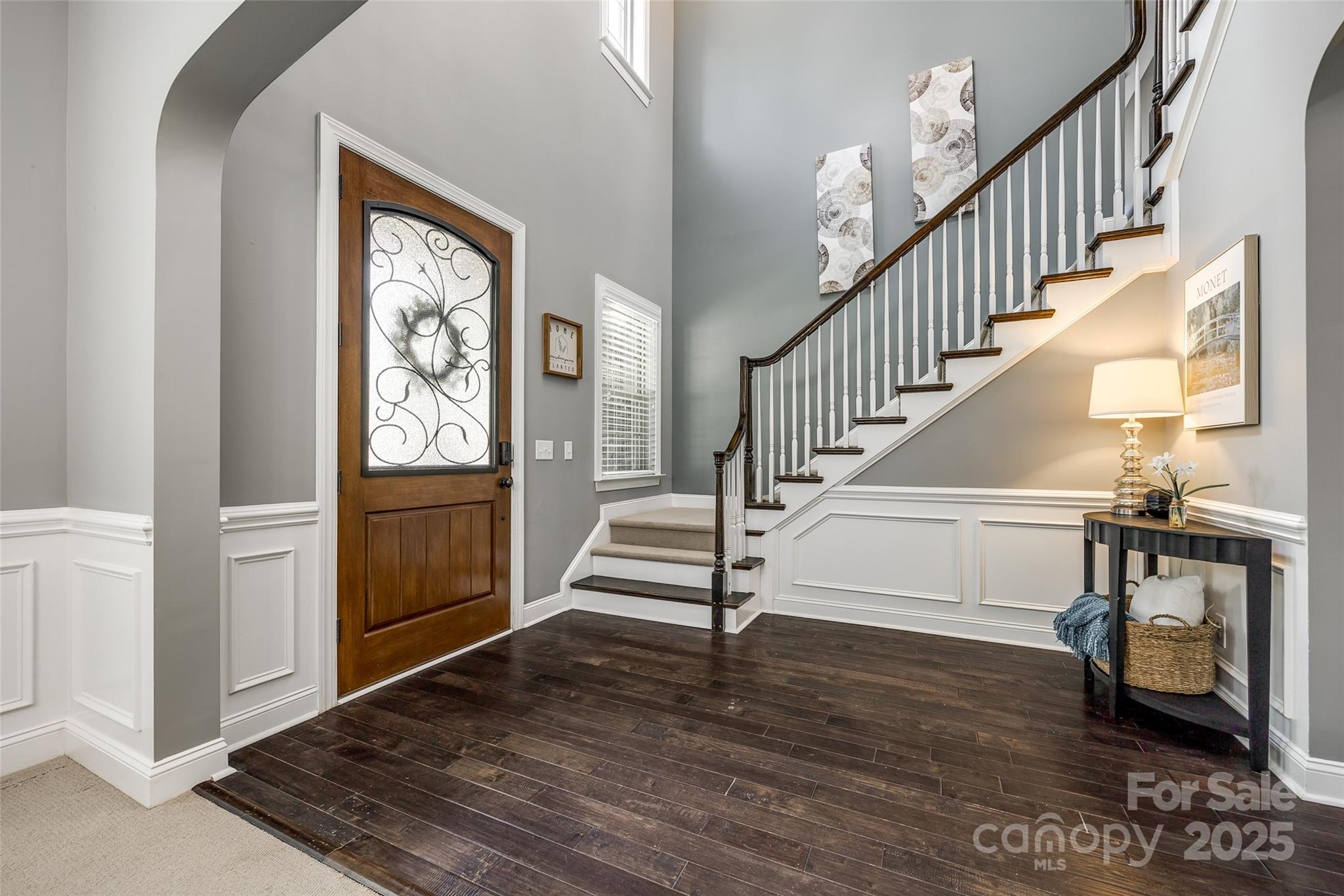 618 Chase Court Fort Mill, SC 29708 - Photo 4 of 48 a view of entryway and hall with wooden floor