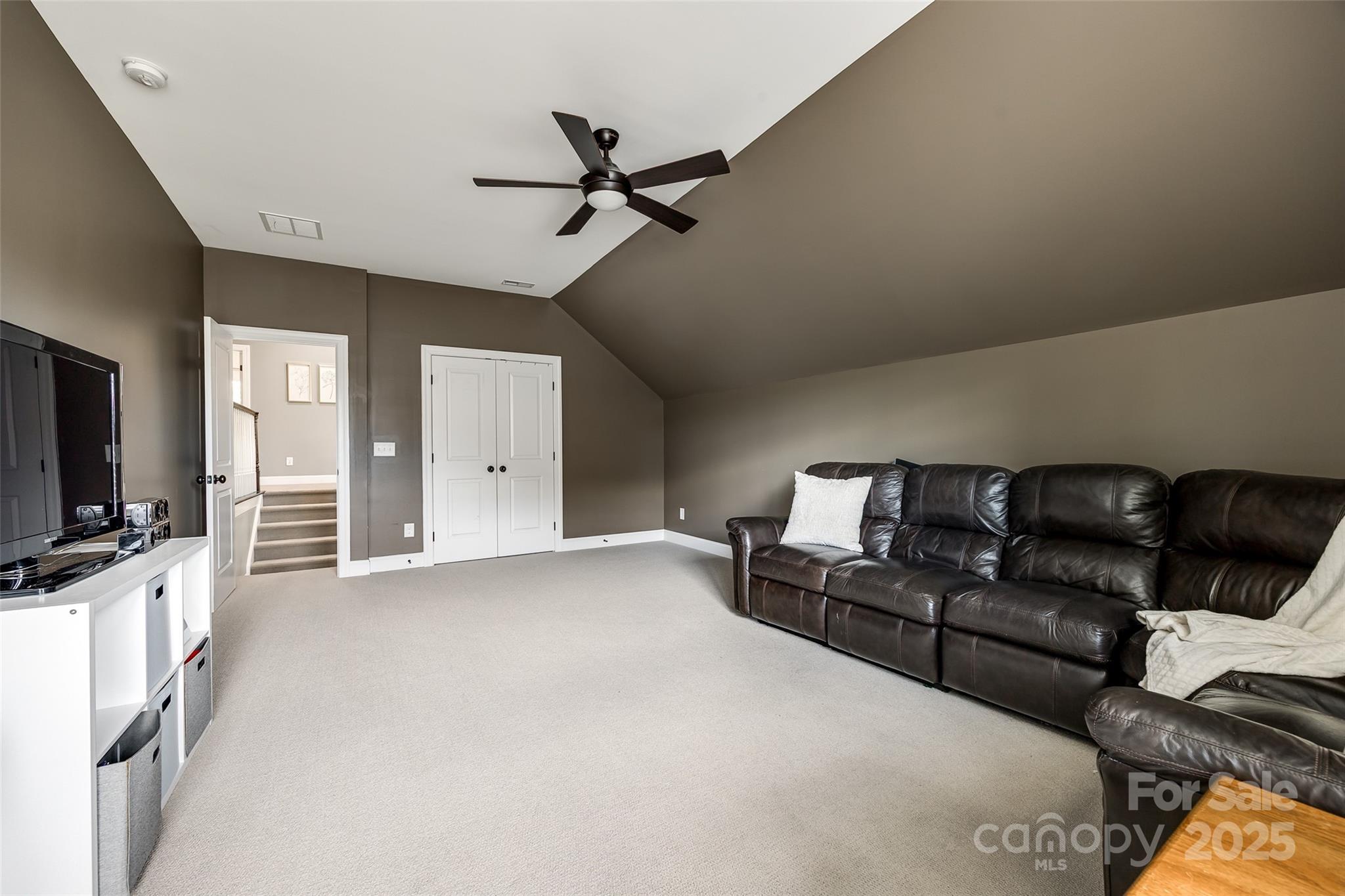 618 Chase Court Fort Mill, SC 29708 - Photo 42 of 48 a living room with furniture and a flat screen tv