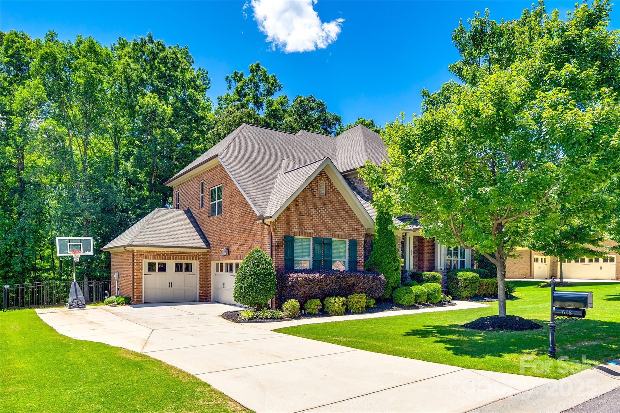 618 Chase Court Fort Mill, SC 29708 - Photo 48 of 48 a front view of a house with a yard and garage