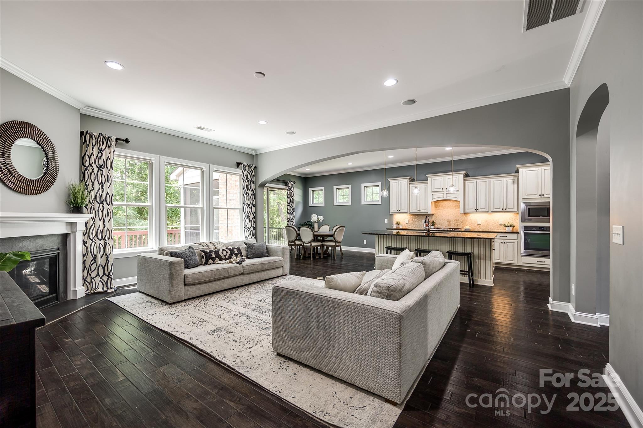 618 Chase Court Fort Mill, SC 29708 - Photo 6 of 48 a living room with fireplace furniture and a large window