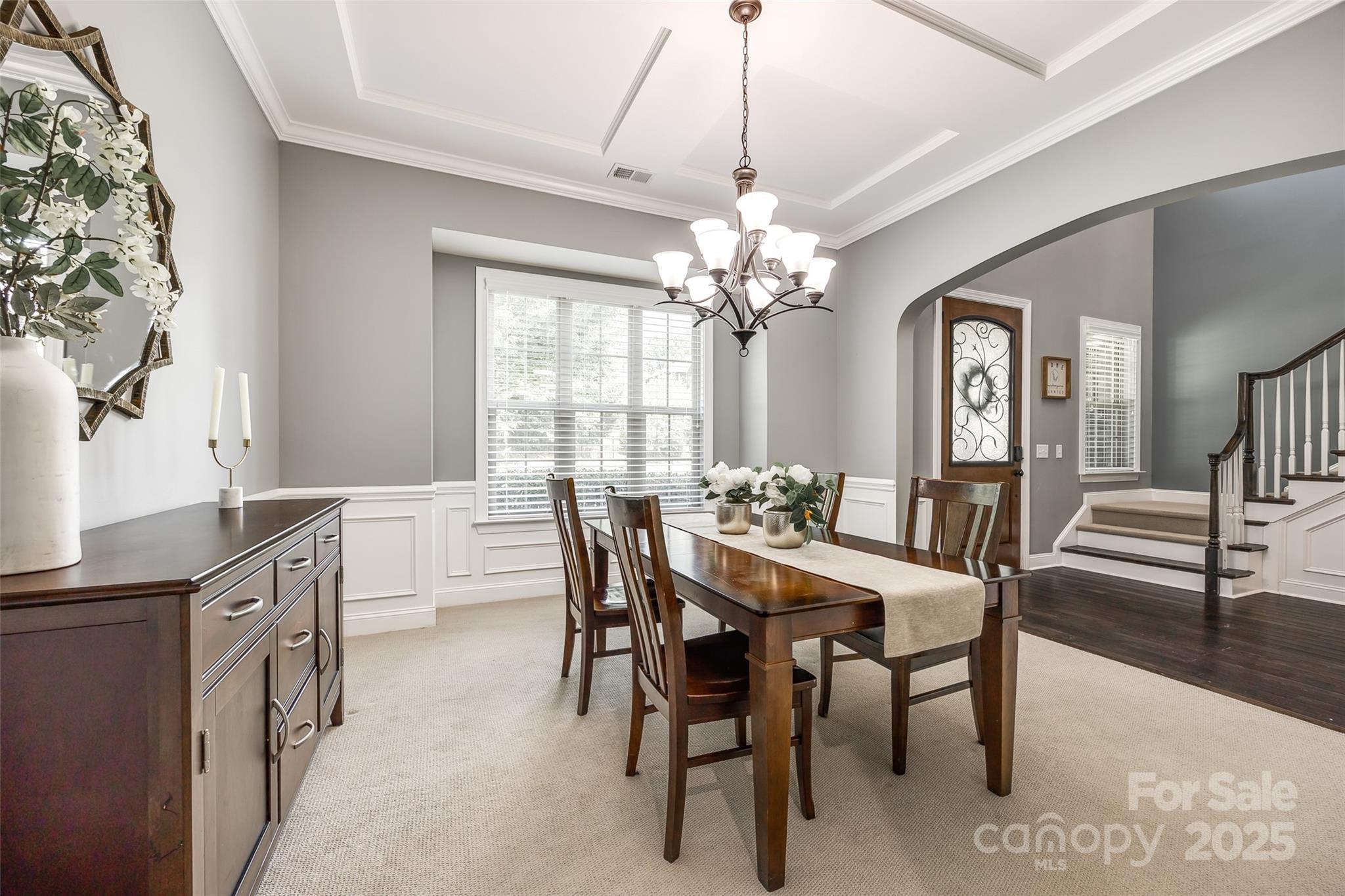 618 Chase Court Fort Mill, SC 29708 - Photo 9 of 48 a view of a dining room with furniture and chandelier