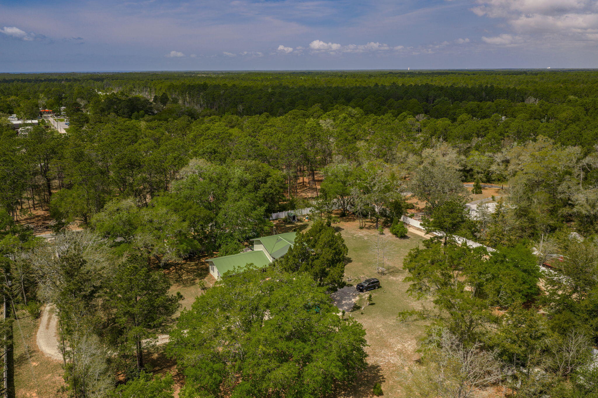 223 Altman Road Freeport, FL 32439 - Photo 48 of 64 47-web-or-mls-DJI_20260330123249_0910_D