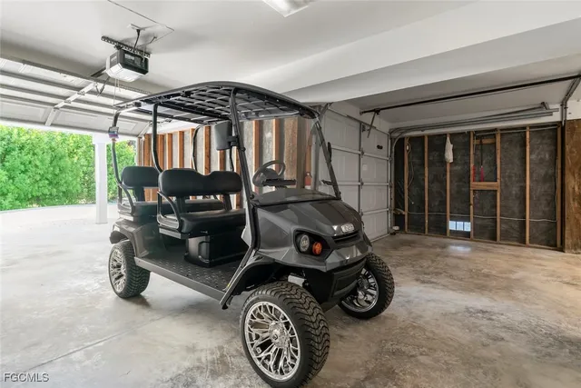 a car parked in front of garage